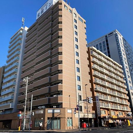 Toyoko Inn Hokkaido Sapporo-Eki Nishi-Guchi Hokudai Mae Bagian luar foto