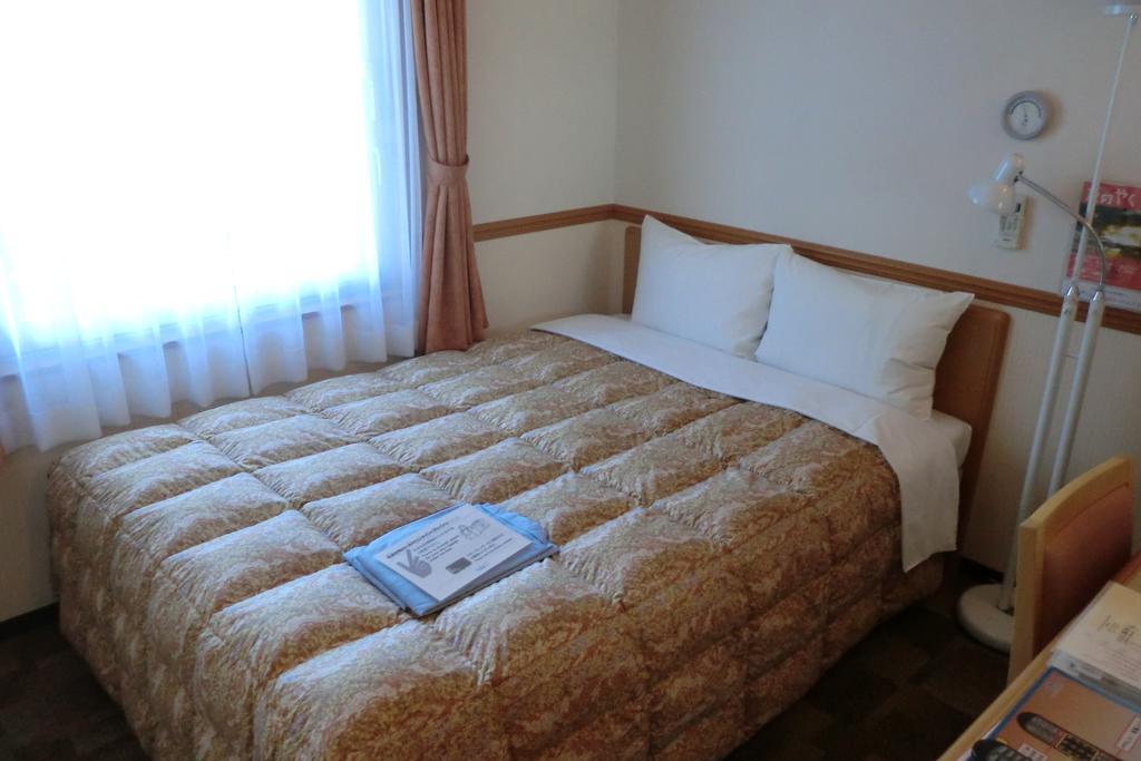 Toyoko Inn Hokkaido Sapporo-Eki Nishi-Guchi Hokudai Mae Bagian luar foto