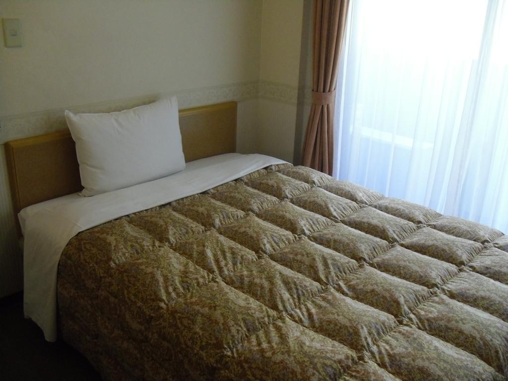 Toyoko Inn Hokkaido Sapporo-Eki Nishi-Guchi Hokudai Mae Bagian luar foto